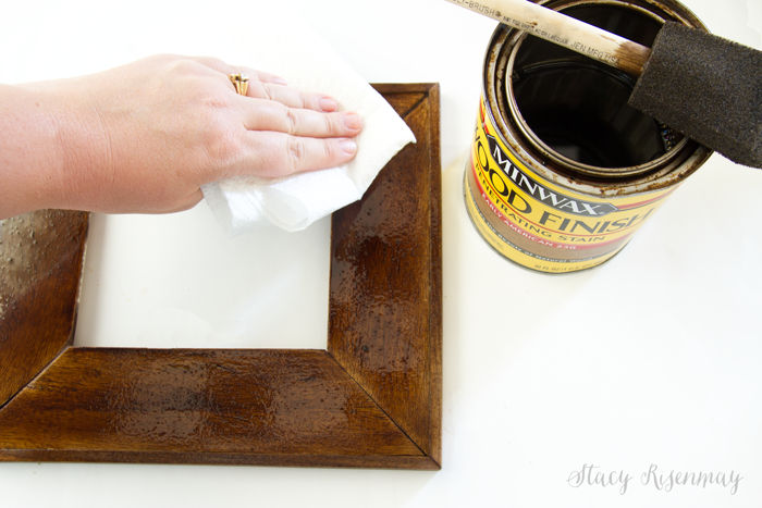 wiping excess stain off frame