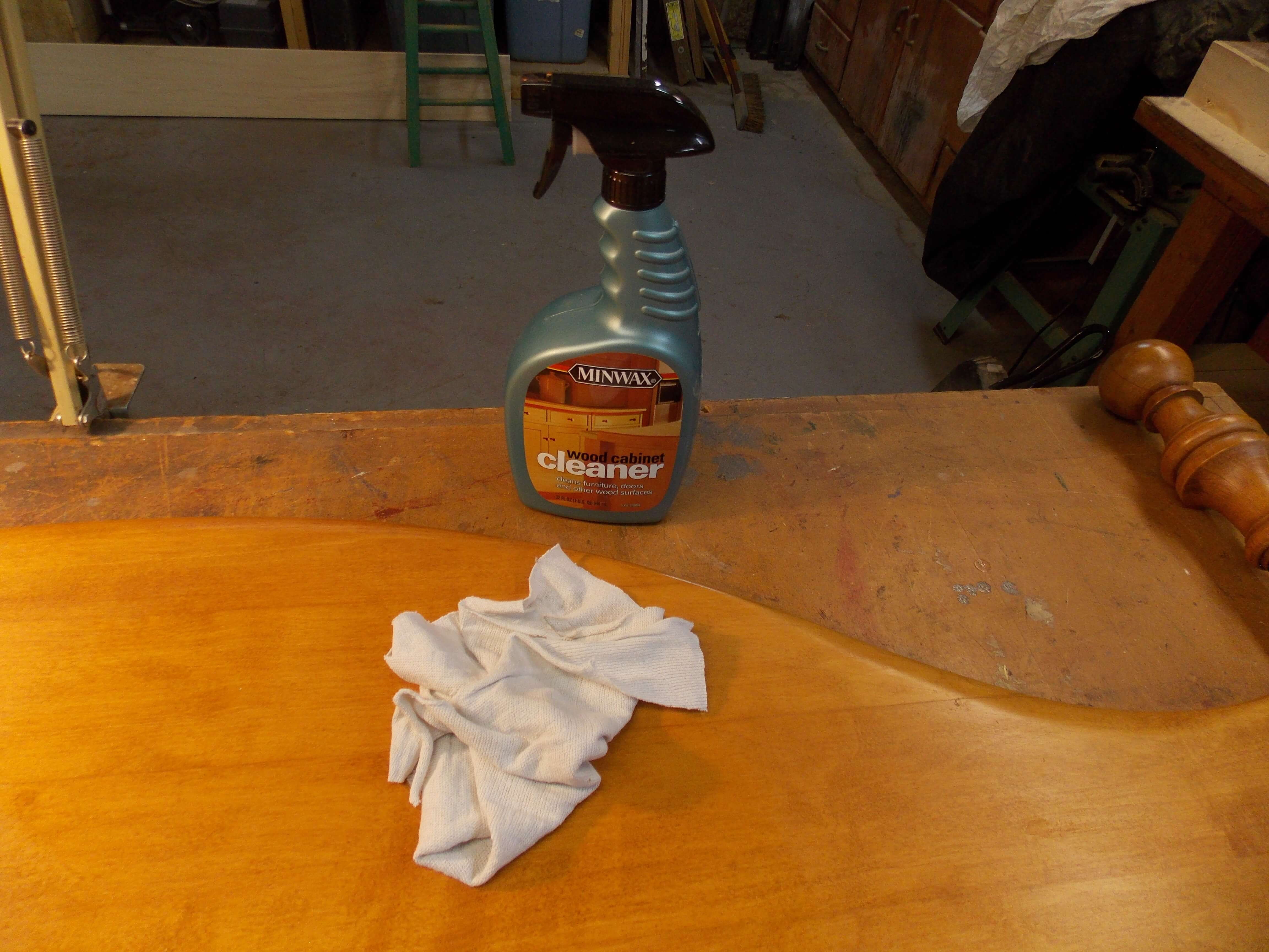 Using Minwax Wood Cabinet Cleaner removes old dirt and grime