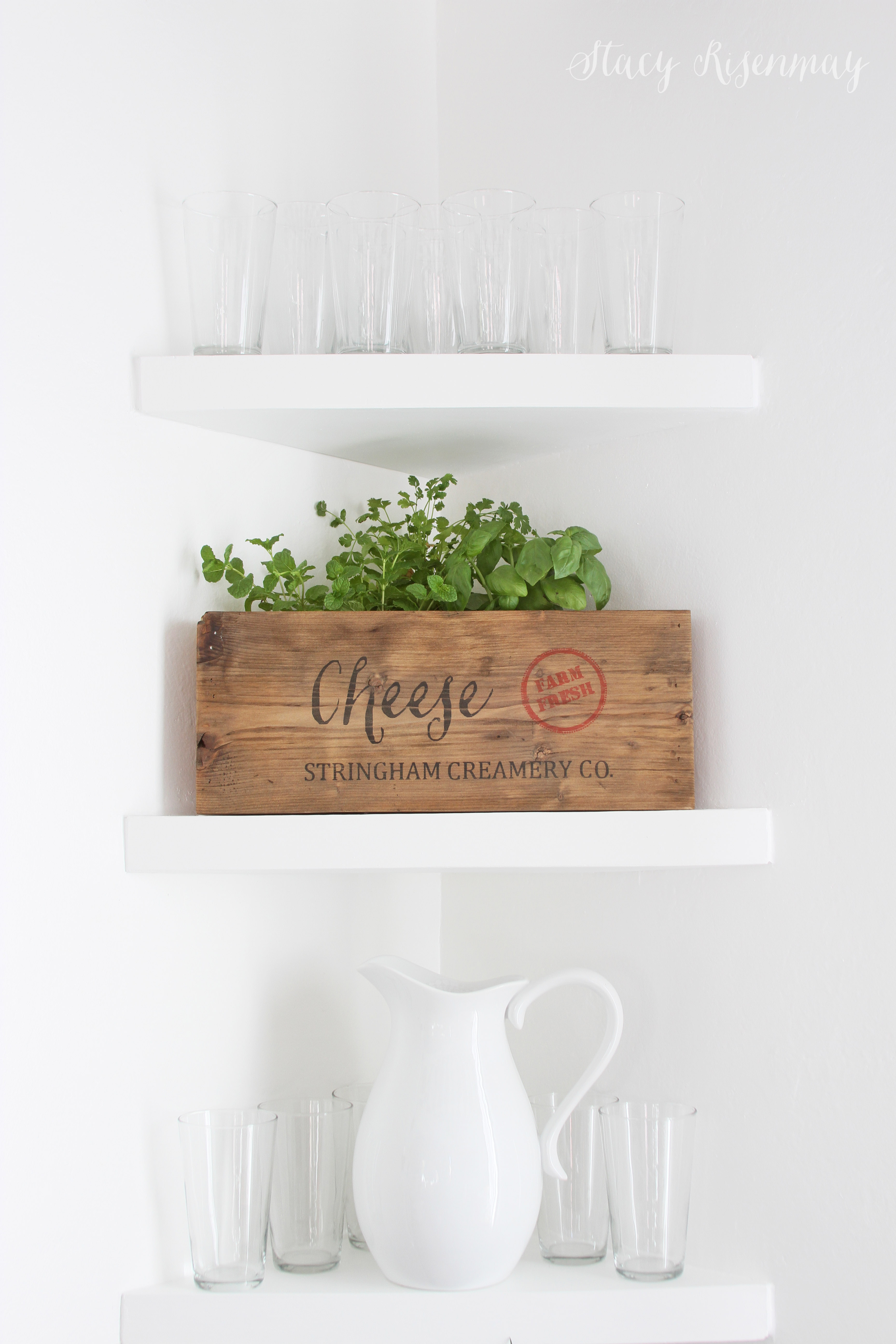 cheese crate as planter in kitchen for herbs