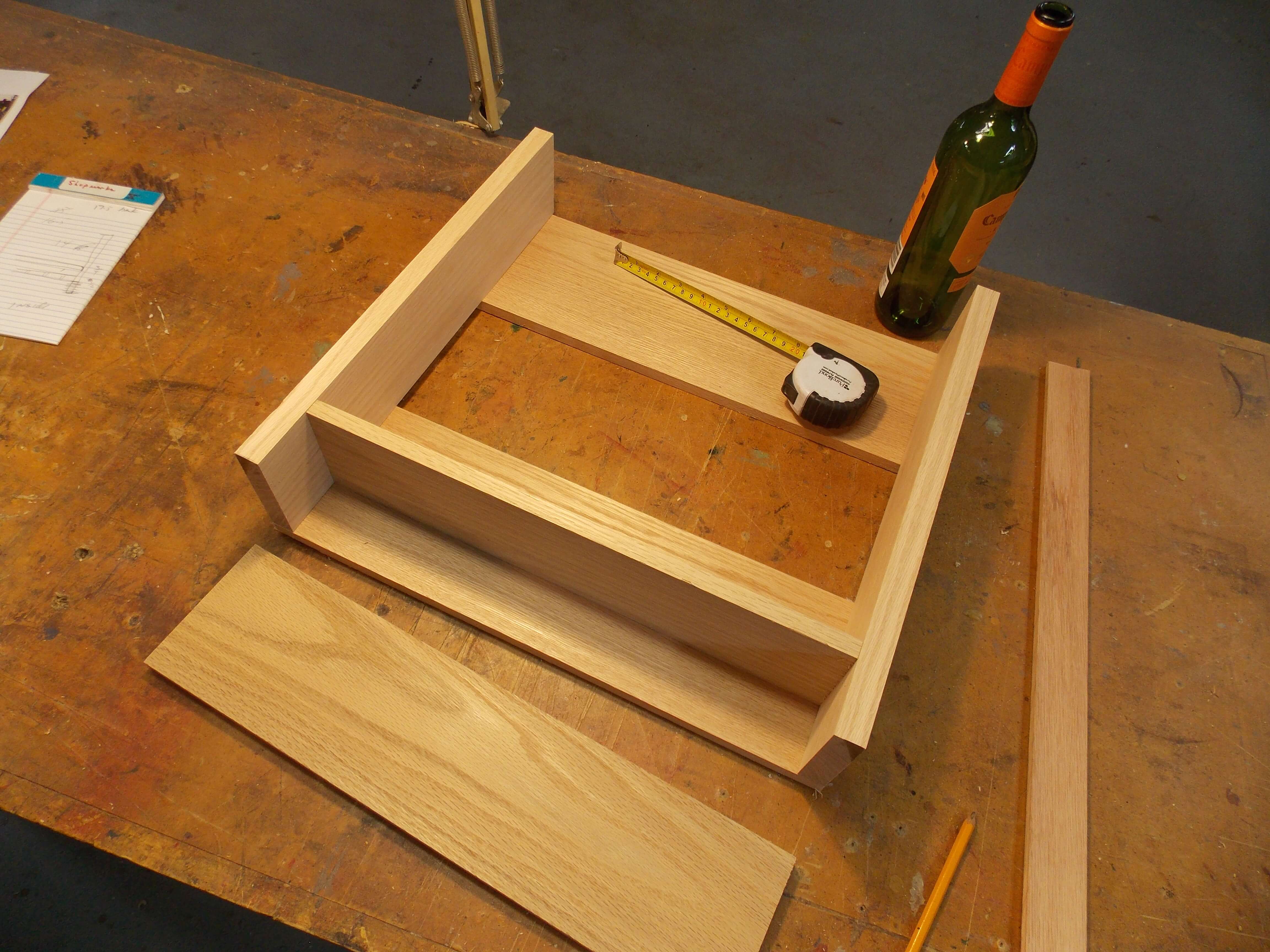 Measure wood pieces to fit the right number of wine bottles